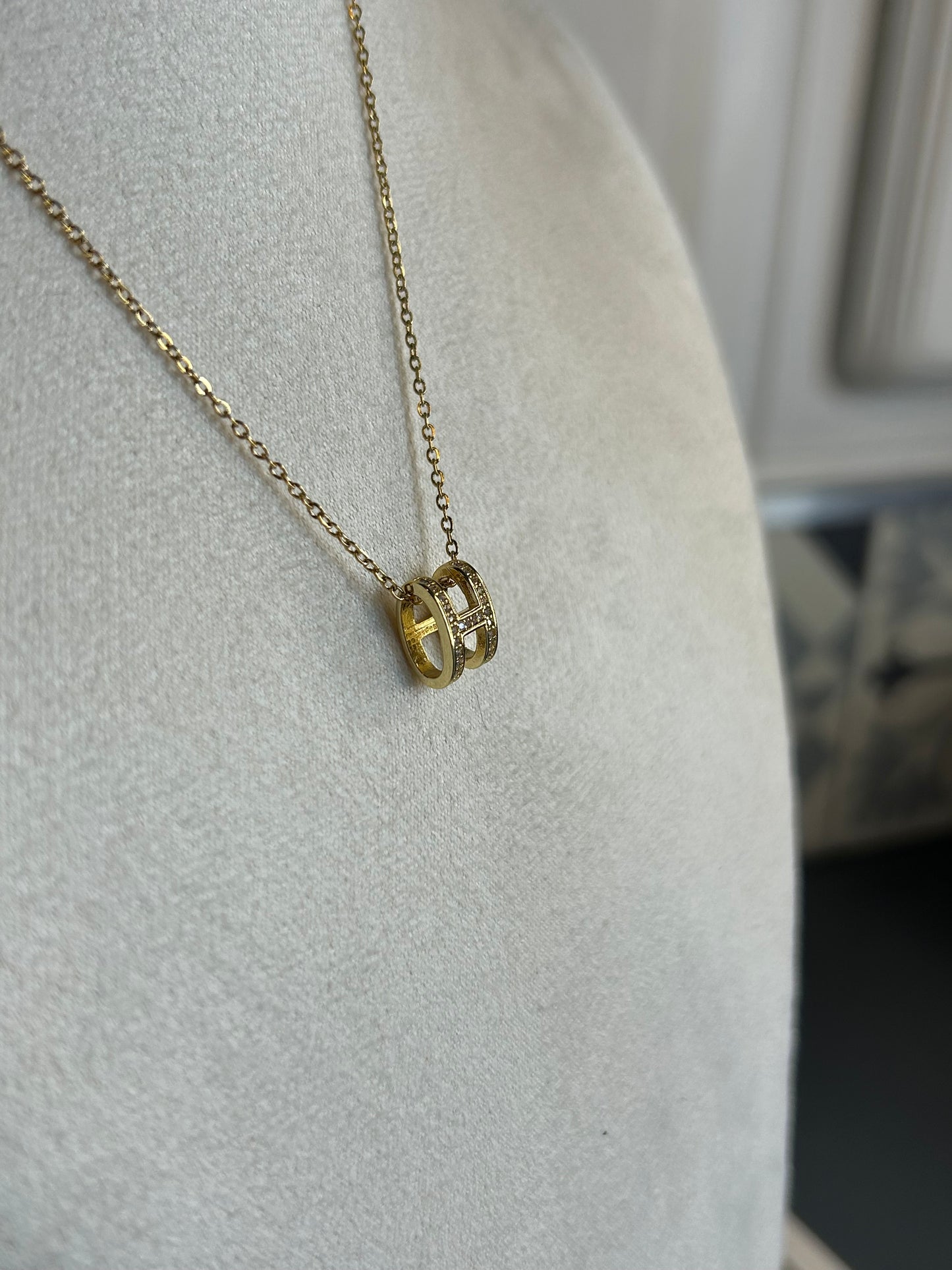 Collier BABY H en acier inoxydable DORÉ