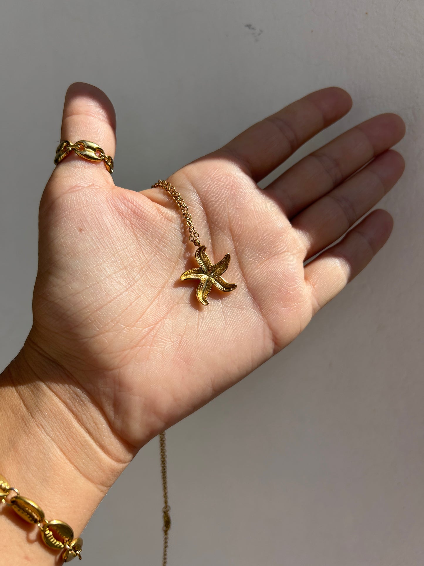 Collier étoile de mer STARLA en acier inoxydable DORÉ
